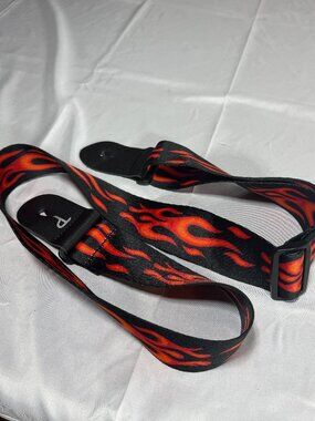 Perri's Guitar straps. One with flames and one with skulls. Rock on!